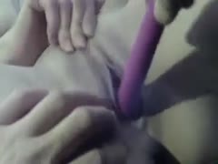 My attractive girlfriend is being prodded with a sex toy.